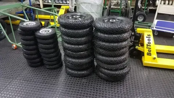 Aros e rodas para pneus de uso industrial